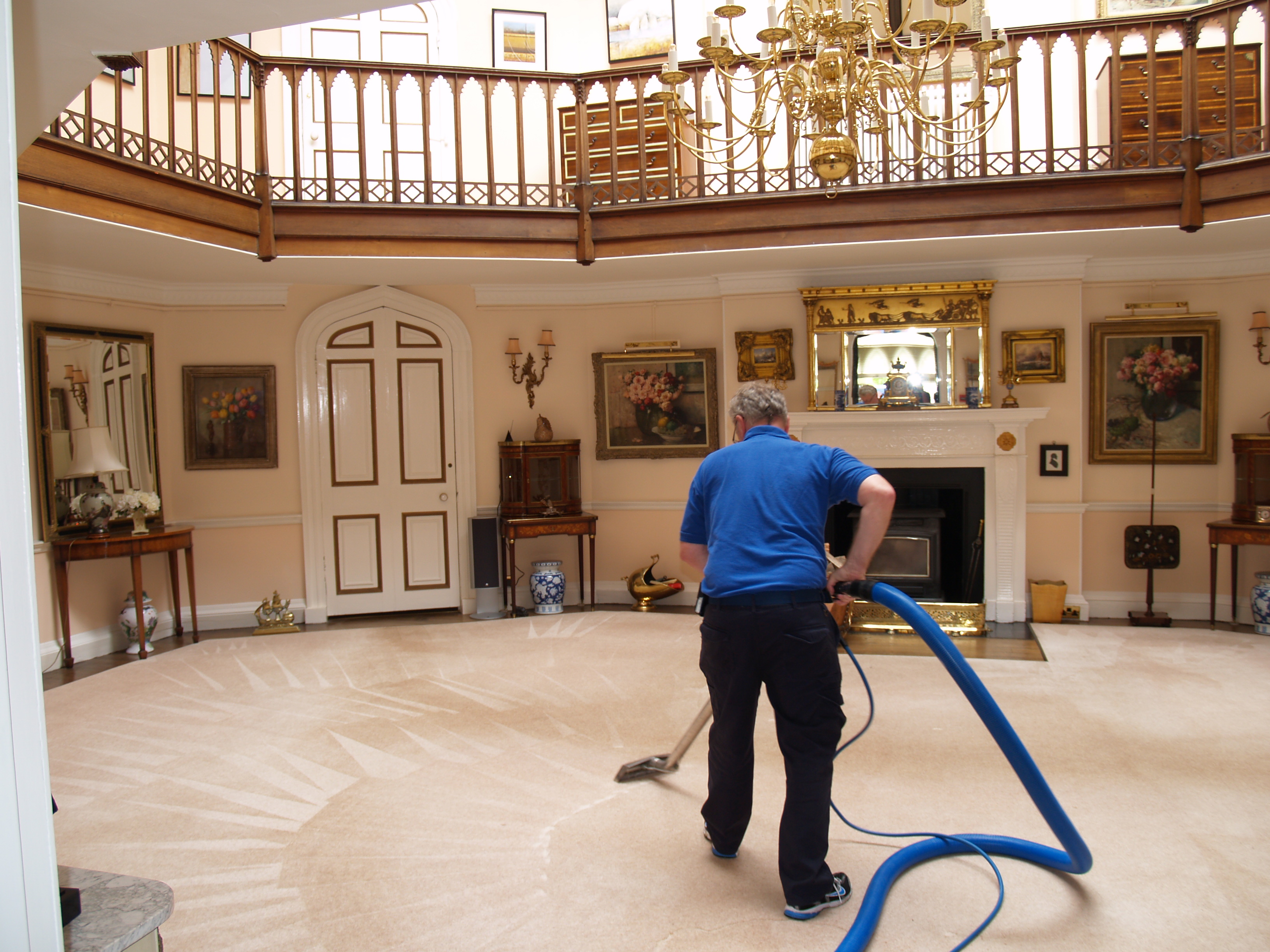Man Cleaning Carpet